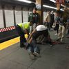 Watch These Subway Heroes Join Forces To Rescue A Man From The Tracks